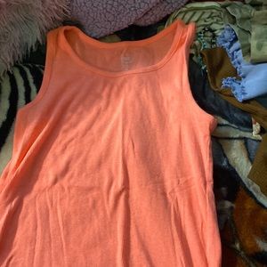 Plain neon pink tank top.